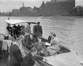 Princess Elizabeth and others on board Enchantress, alongside another day launch